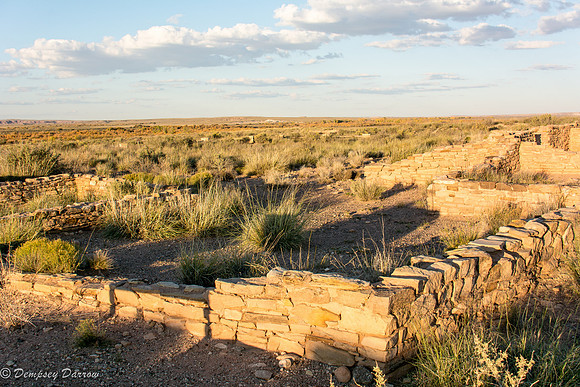 Sunset bathing the ruins of Puerco Pueblo.